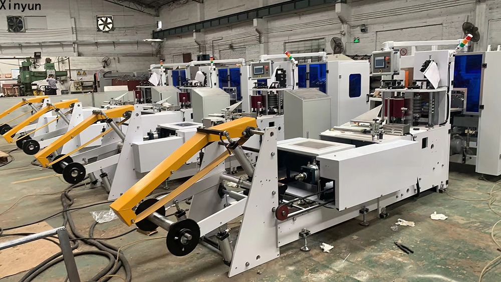 Automatic transferring napkin tissue paper making machine