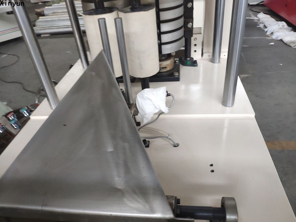XY-OQ-7000A Low price 240X240 mm serviette tissue machine