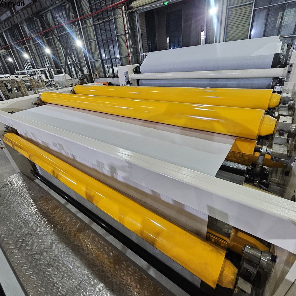 Automatic glue lamination toilet paper perforating machine